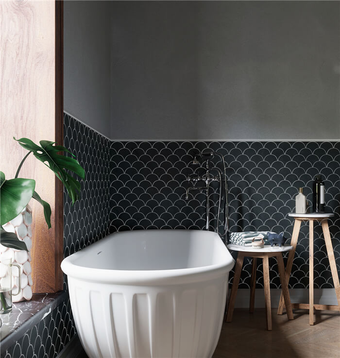 modern bathroom enhanced with a black fish scale mosaic tile wall.jpg