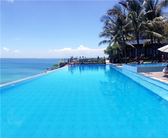 resort outdoor pool uses modern pool tile to decorate.jpg