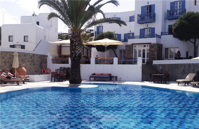 swimming pool using Mediterranean style blue pool tiles.jpg