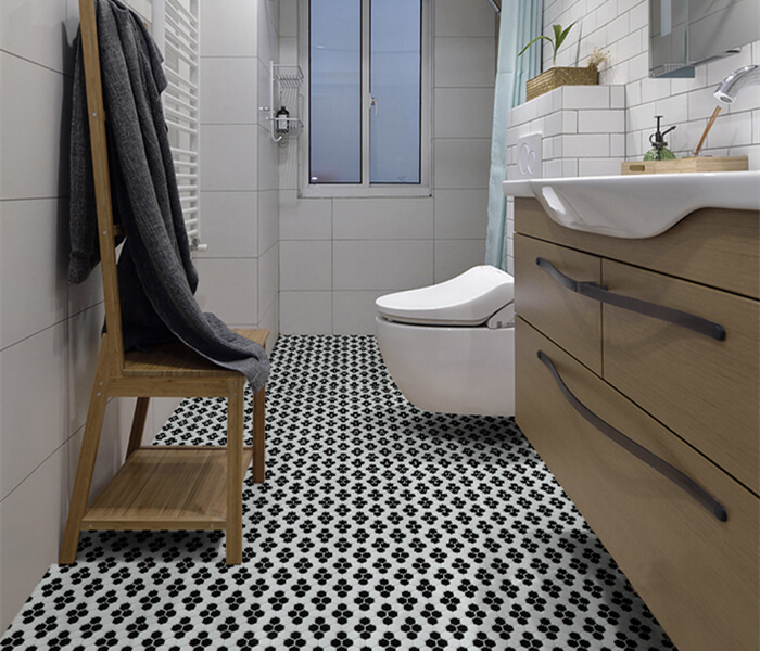bathroom using black white hexagon mosaic flooring.jpg