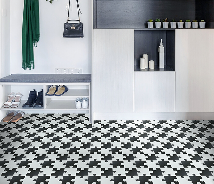 cloakroom using black white puzzle design floor tile mosaic.jpg