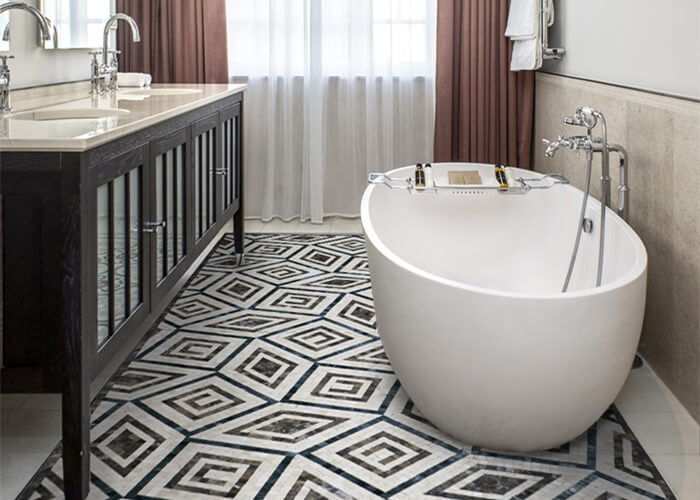 geometric design stone mosaic flooring for bathroom.jpg