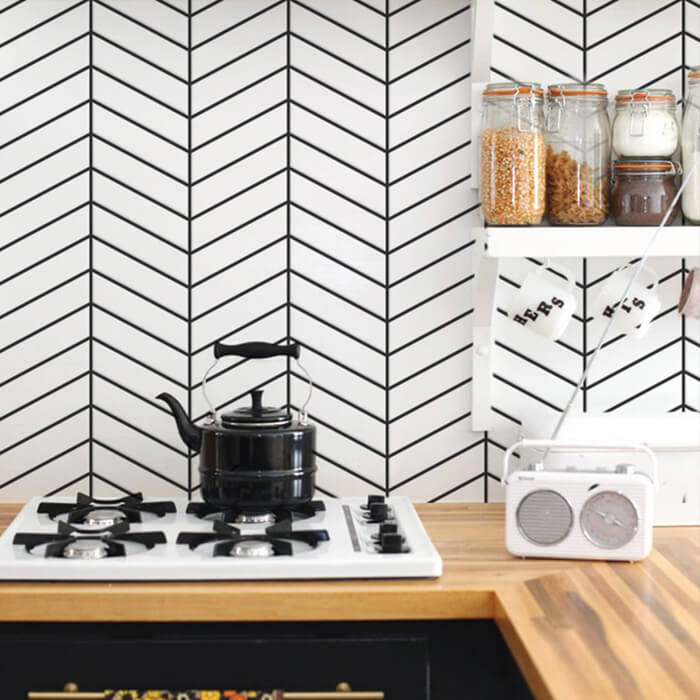 kitchen design using herringbone white tiles.jpg