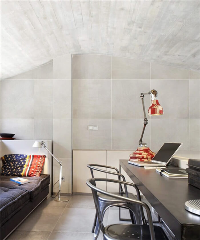 loft uses cement look porcelain tiles for wall and floor.jpg