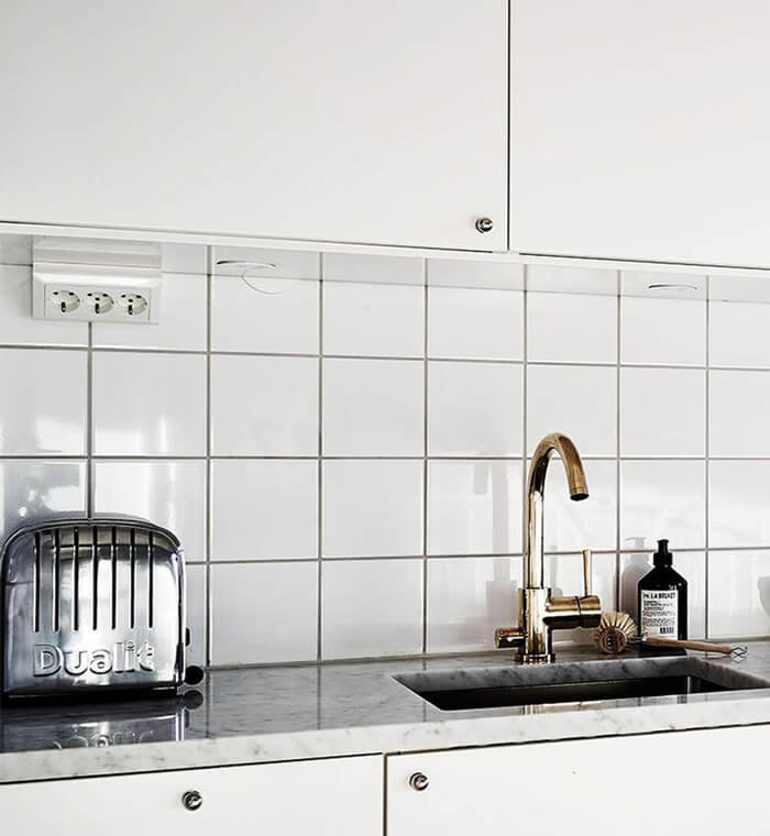 kitchen using glossy glazed square subway tile for backsplash.jpg