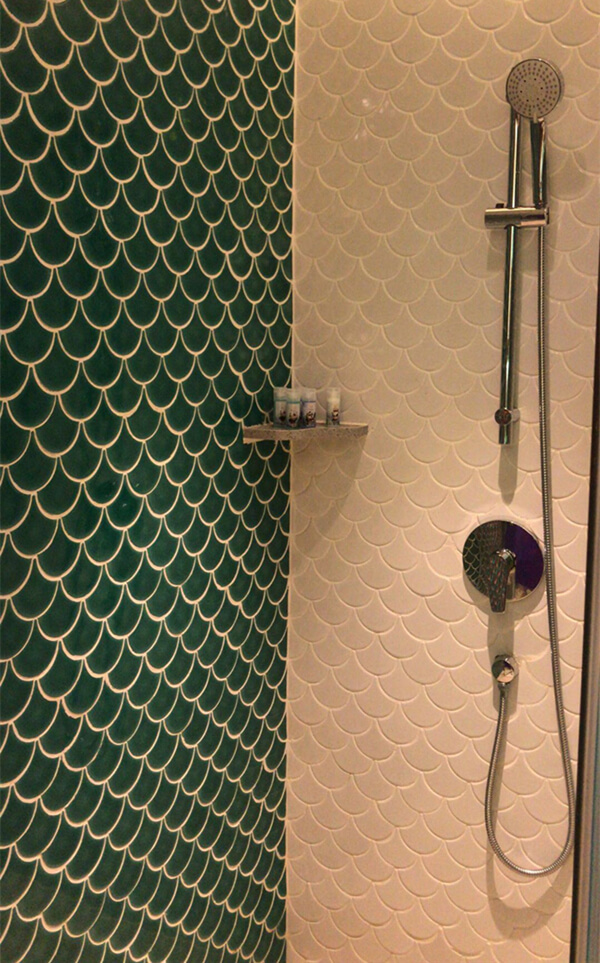 green white moroccan tile decorated shower.jpg
