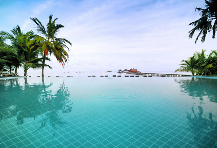 resort big pool with 100mm heavy crackle ceramic pool tile.jpg