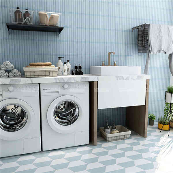 laundry room with blue porclein subway tiles
