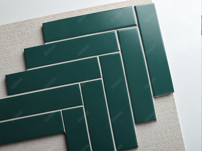 green herringbone tile