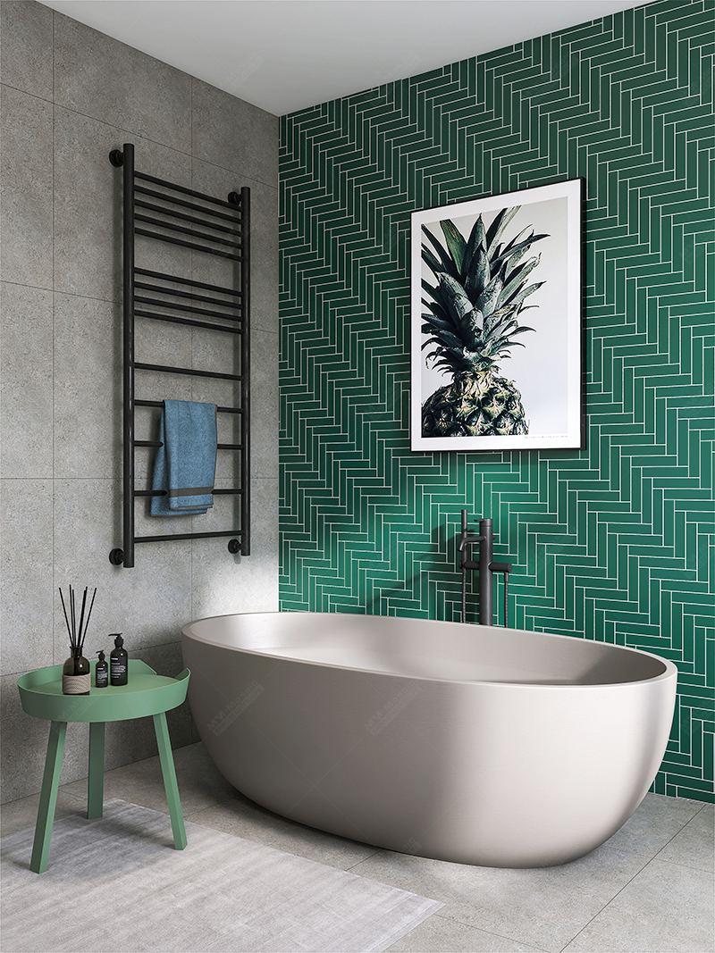 dark green herringbone tile bathroom wall