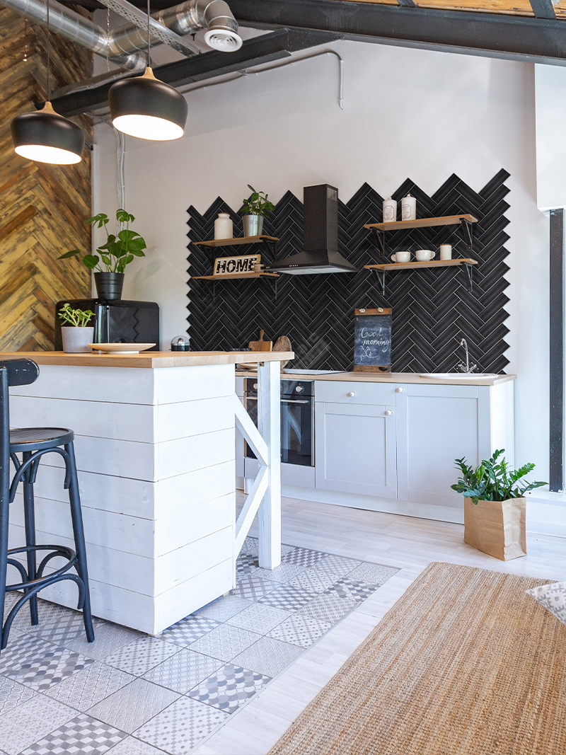 farmhouse with black kitchen backsplash tile