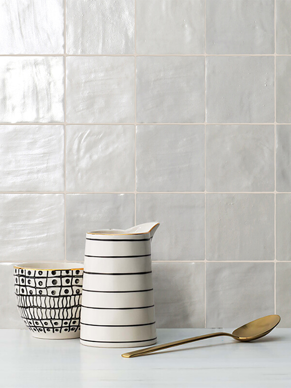 white ceramic tile as kitchen backsplash
